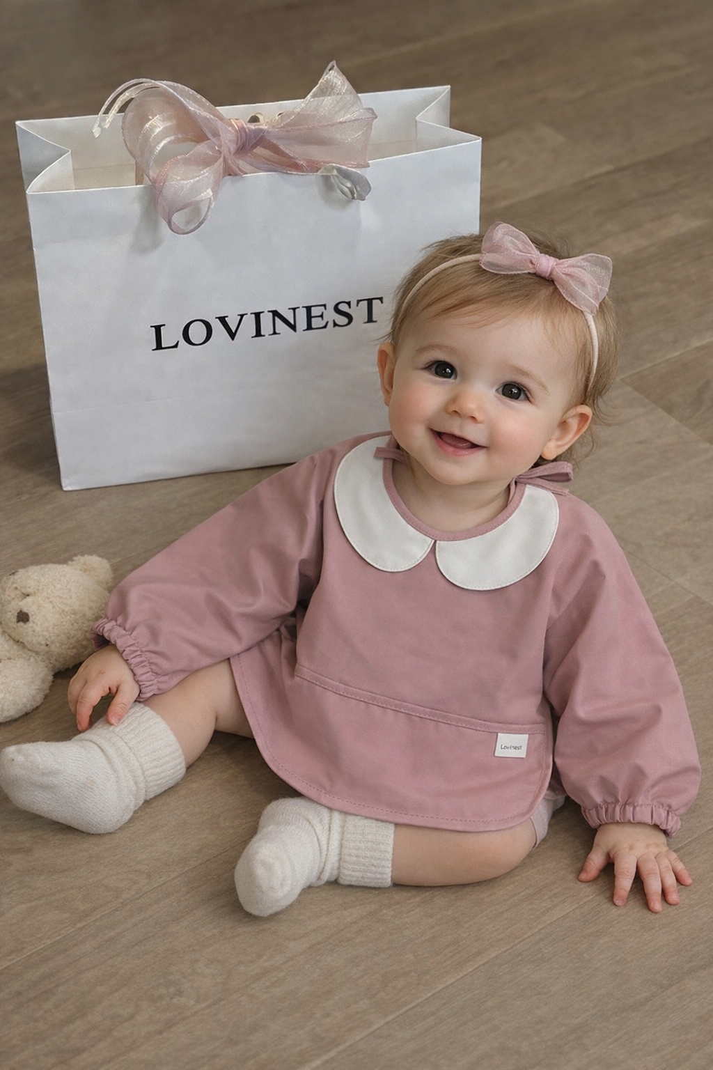 bavoir manches longues Lovinest. Lovinest